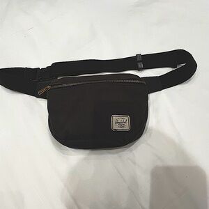 Herschel crossbody bag, slightly faded, no rips. Very good used condition.